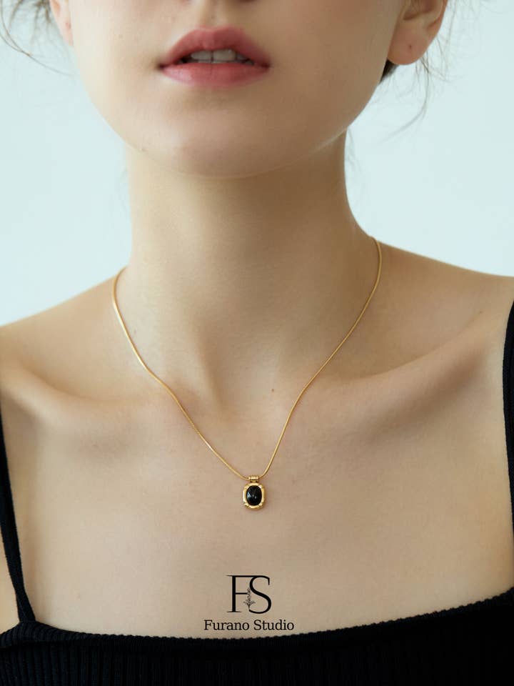 Black Onyx Oval Pendant, Non Tarnish Gemstone Necklace for wholesale by Furano Studio