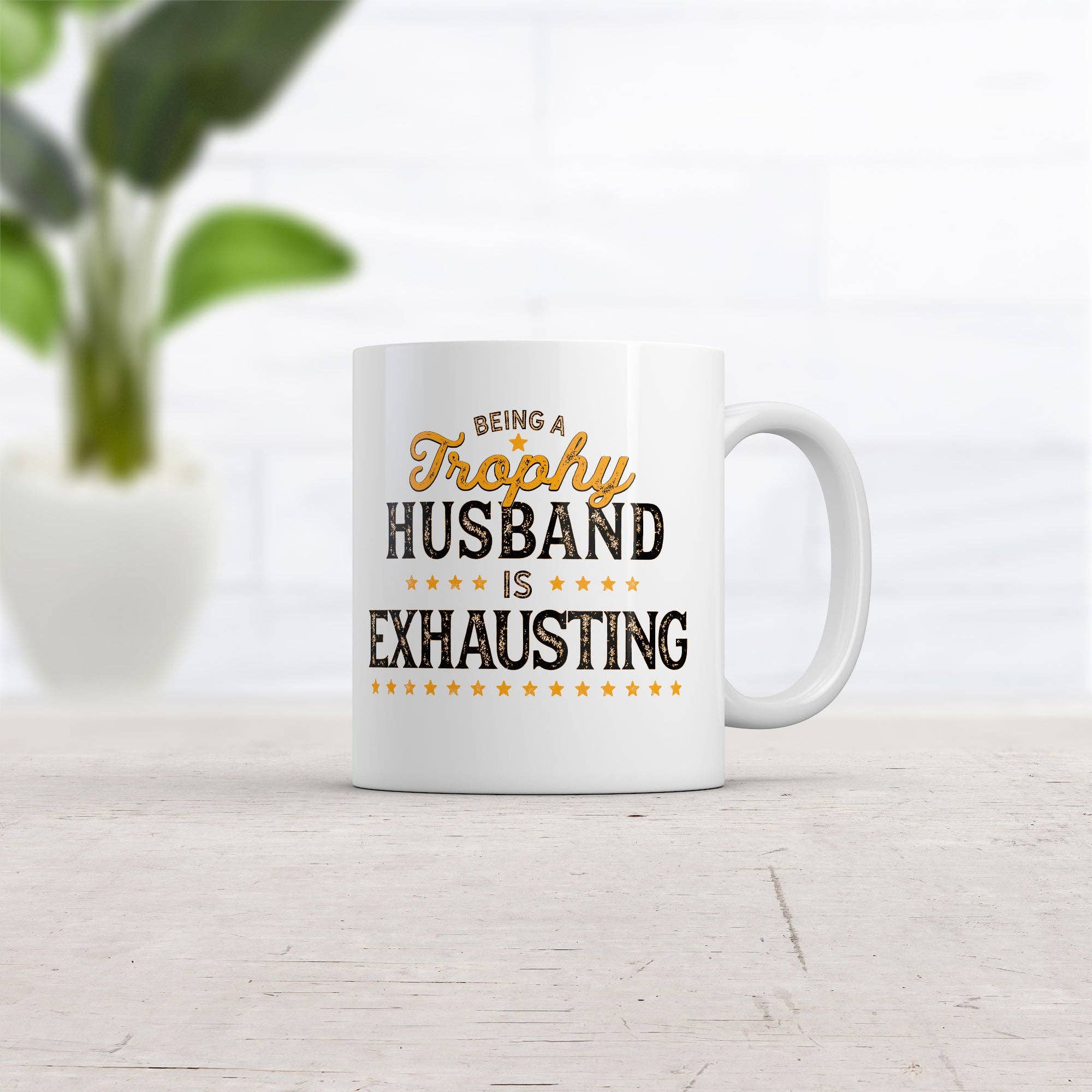 White Being A Trophy Husband Is Exhausting Mug sarcastic Graphic for wholesale on Faire1