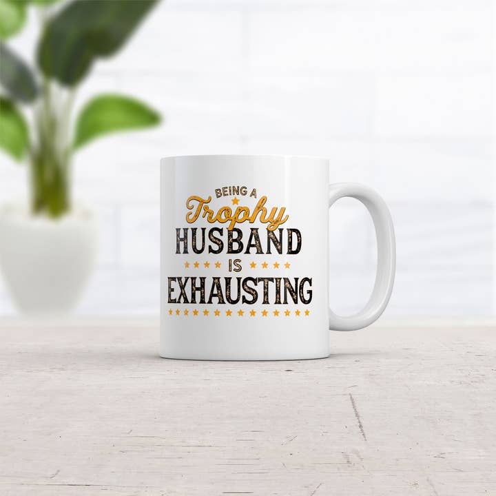 White Being A Trophy Husband Is Exhausting Mug sarcastic Graphic for wholesale on Faire1