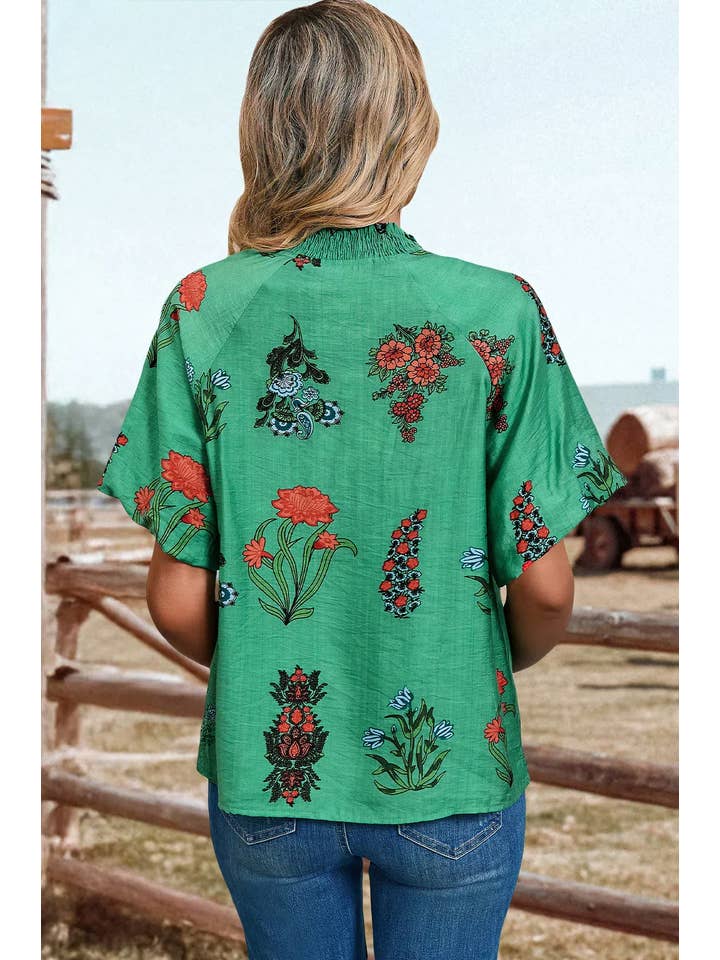 As shown Fashion-W Floral Buttoned V Neck Short Sleeve Blouse for wholesale on Faire