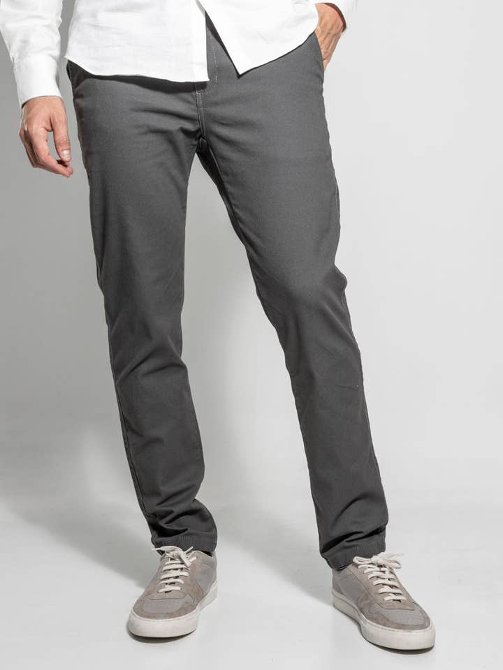 Pantalon élastique gris pour la vente par DANTE