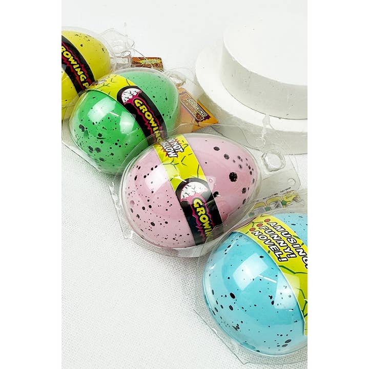 MIX COLOR Dinosaur Growing Pet Egg Toy for wholesale on Faire