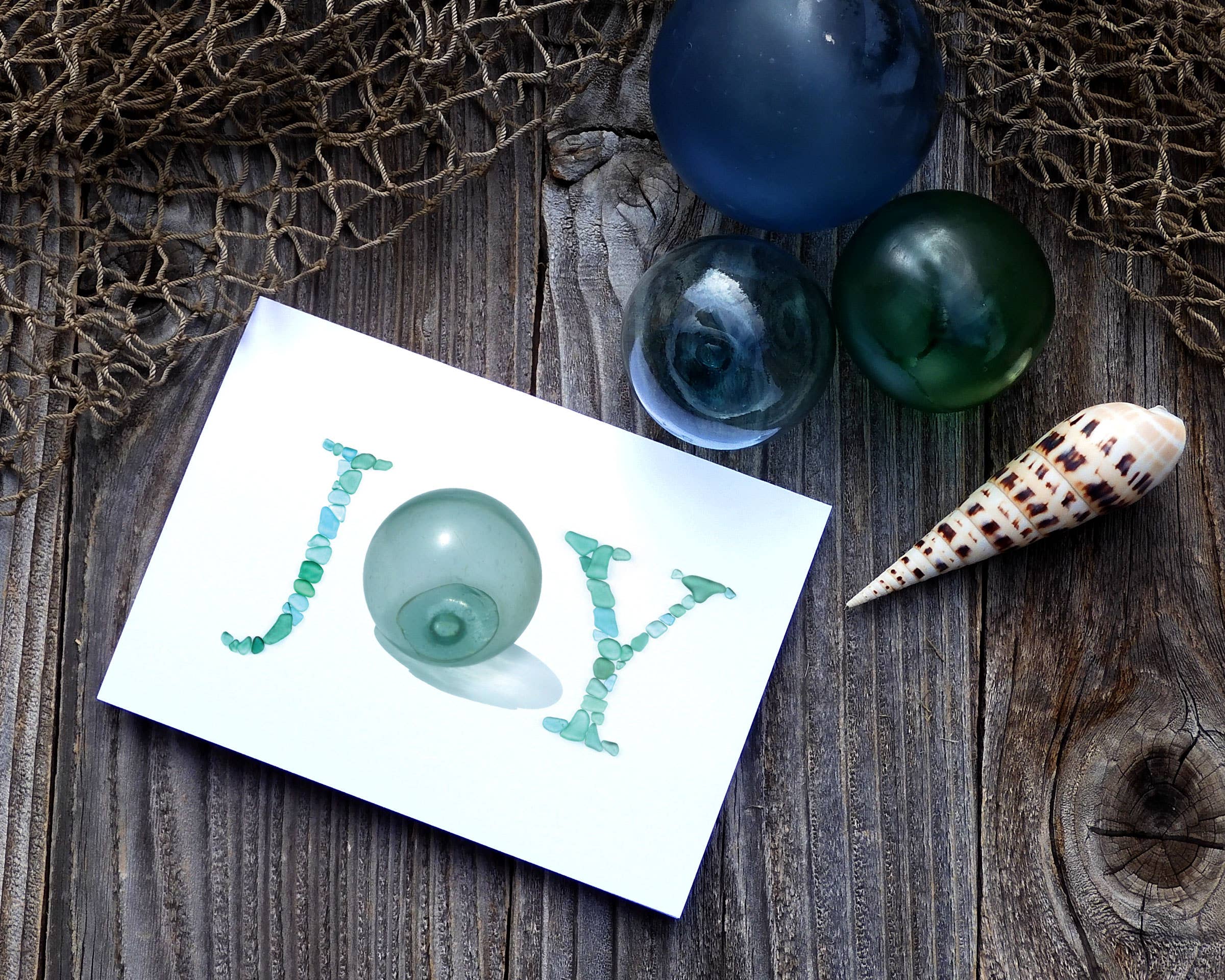 Beachcombing / Etched by the Sea – Großhandel Weihnachtskarte – Sea Glas Float JOY Urlaubsk1