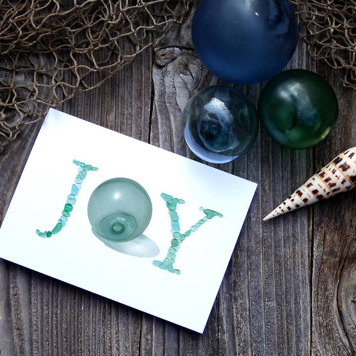 Beachcombing / Etched by the Sea – Großhandel Weihnachtskarte – Sea Glas Float JOY Urlaubsk1