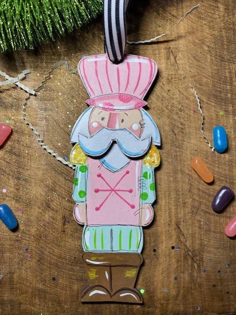 Pink nutcracker Christmas ornament can be personalized for wholesale by Pink Fish Studios, LLC.