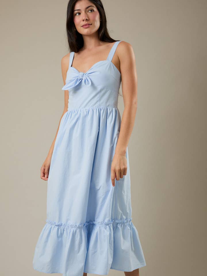 ROBE MIDI ÉVASÉE SANS MANCHES AVEC NŒUD À L'AVANT pour la vente par Sunday Edition