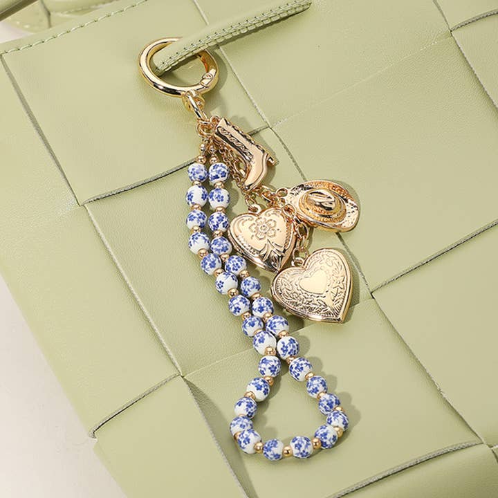 Sensibling Corp. - Wholesale Keychain - Women's - Heart Locket Cowboy Ceramic Ball Wristlet Keychain Bag Charm