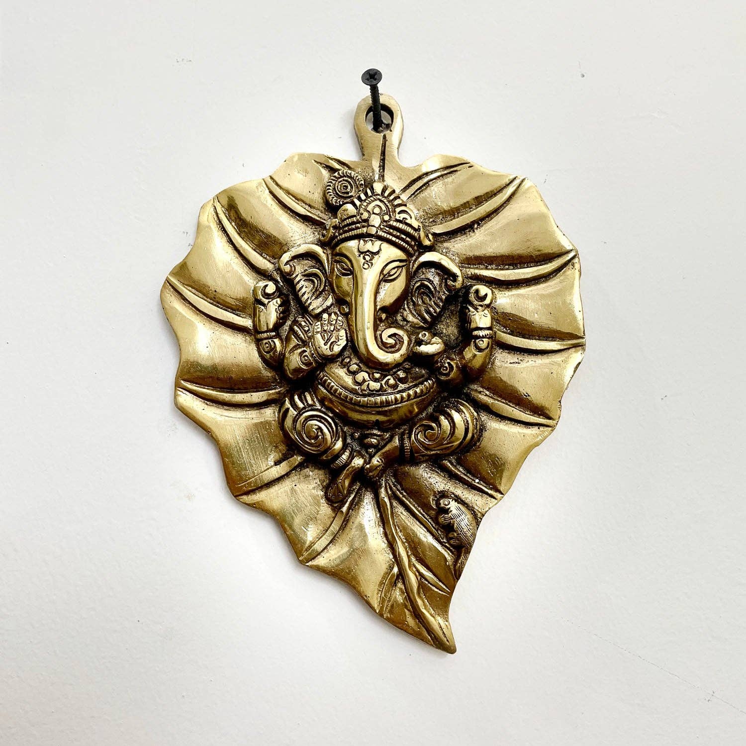 Golden Brass Ganesha Wall Hanging on Antique Peepal Leaf|Ganpati Idol for Home Decor & Diwali| Ganesh Hanging Decor For Good Luck for wholesale on Faire1