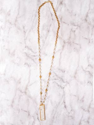 SHE'S LEGENDARY WHITE MARBLE RECTANGLE PENDANT ON A WHITE CRYSTAL GOLD NECKLACE for wholesale on Faire