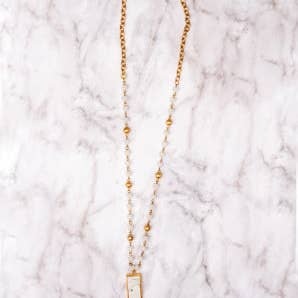 SHE'S LEGENDARY WHITE MARBLE RECTANGLE PENDANT ON A WHITE CRYSTAL GOLD NECKLACE for wholesale on Faire0