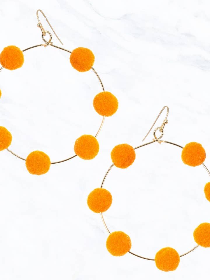 Open Hoop with Puff Balls Drop Earrings for wholesale by Suzie Q USA