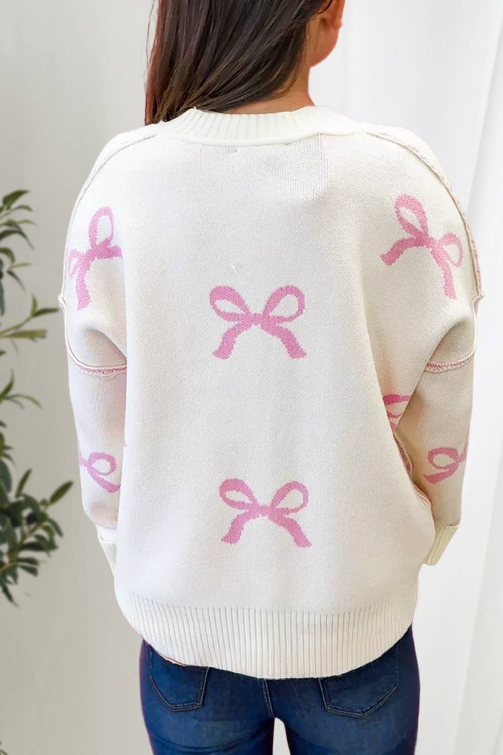 As shown Lovely Bow Knot Ribbed Detail Sweater | S-XL for wholesale on Faire1