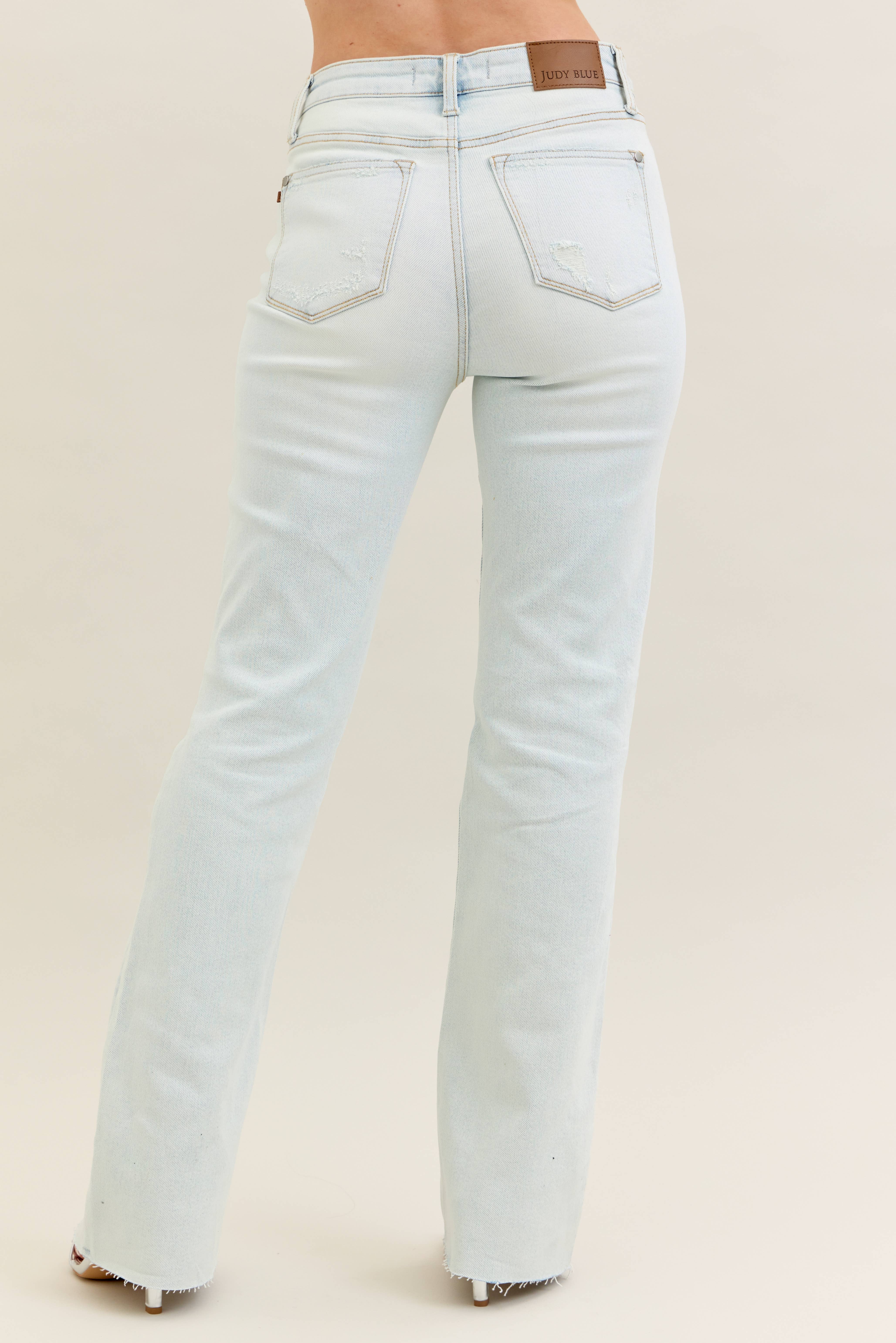 LT Mid Rise Distressed & Fray Hem Bootcut for wholesale on Faire7