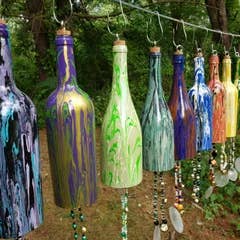 Multiple Wine Bottle Wind Chimes for wholesale on Faire