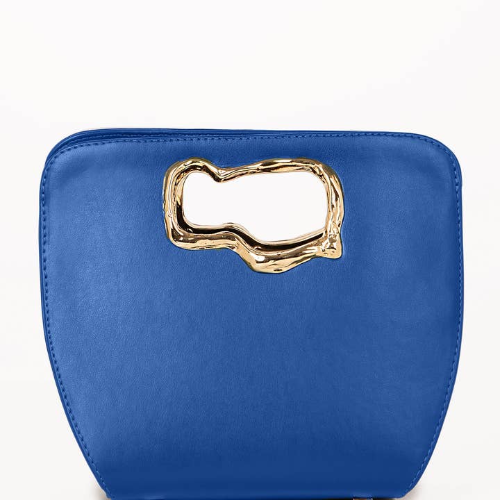 Blauw Calliope blauwe gestructureerde mini tas met kenmerkende golvende handgreep voor groothandel op Faire