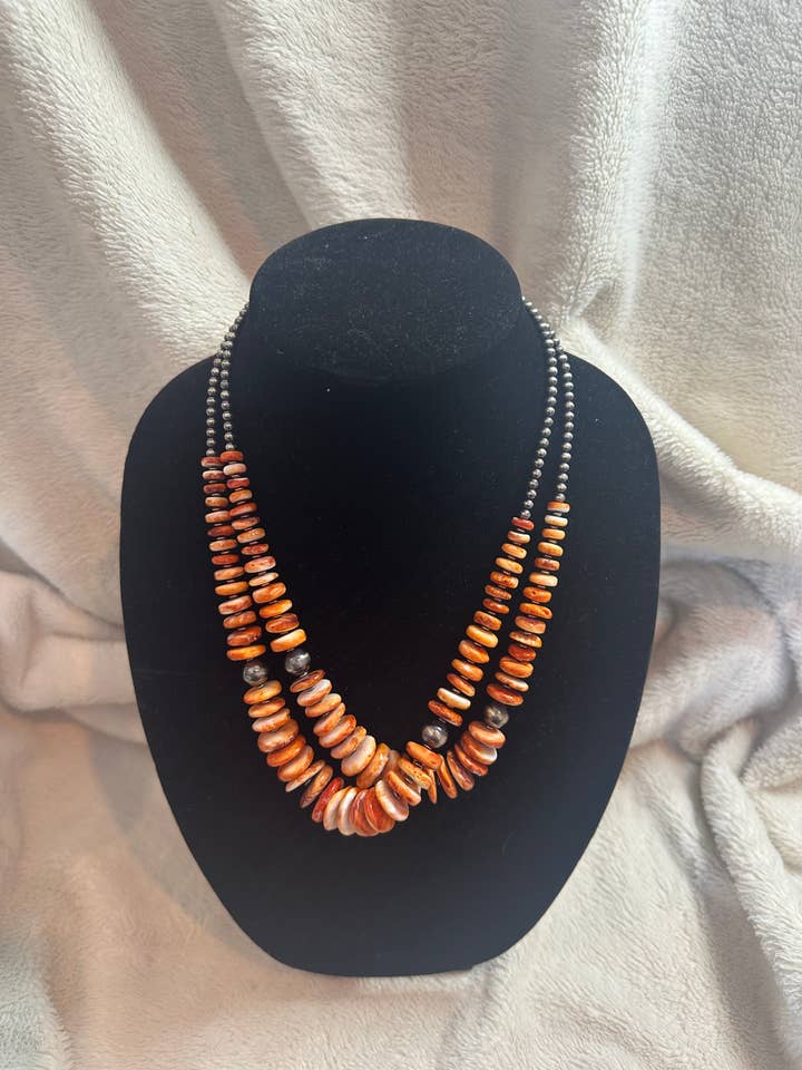 8-18mm orange spiny graduated necklace for wholesale by BDN Boutique