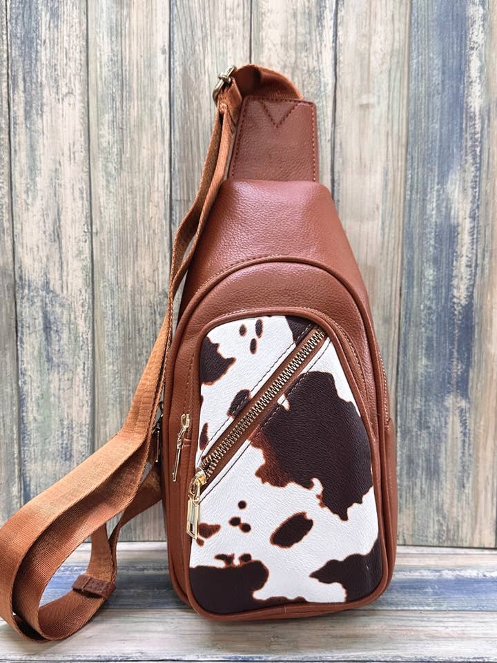 SAC BANDOULIÈRE IMPRIMÉ VACHE (Copie) pour la vente par DESHENG ENTERPRISE