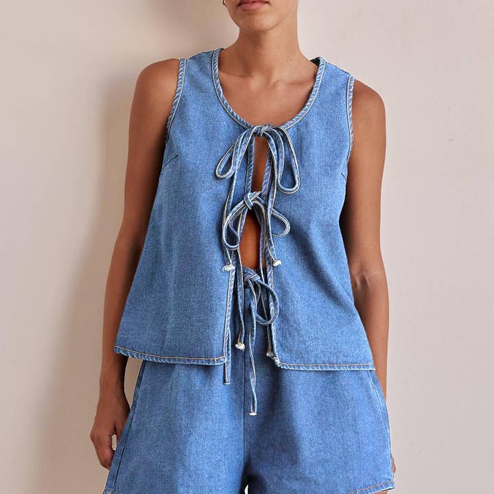 Wash Denim Tie-Front Vest & High-Waist Shorts Set and other Purchase Wholesale authentic sneakers. Free Returns & Net 60 Terms on Faire trending on Faire.