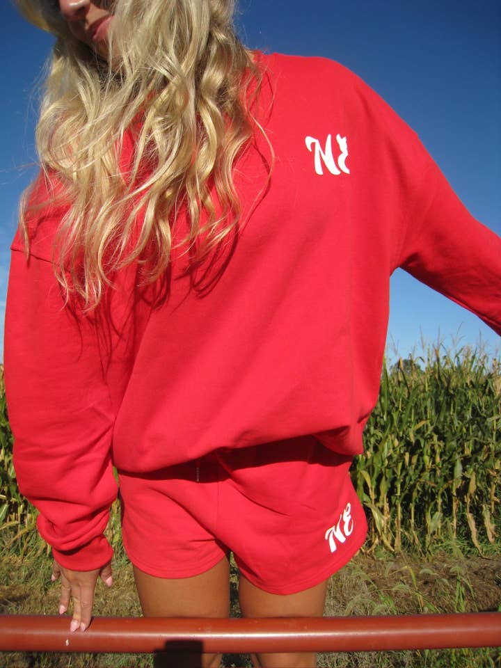 Red NE Good Life Core Sweatshirt for wholesale on Faire18