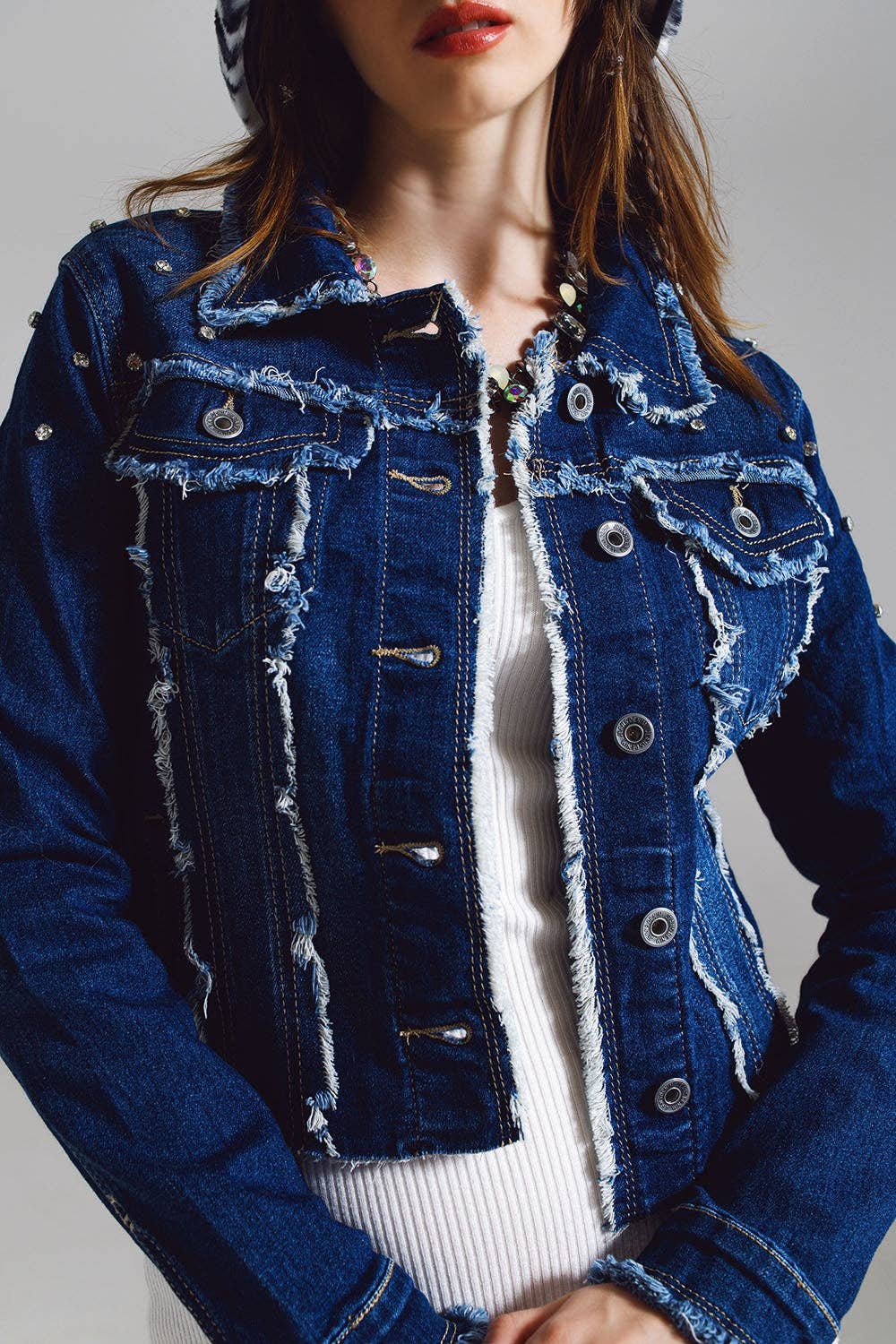 Blue Denim jacket with frayed and embroidered details in Midwash for wholesale on Faire4