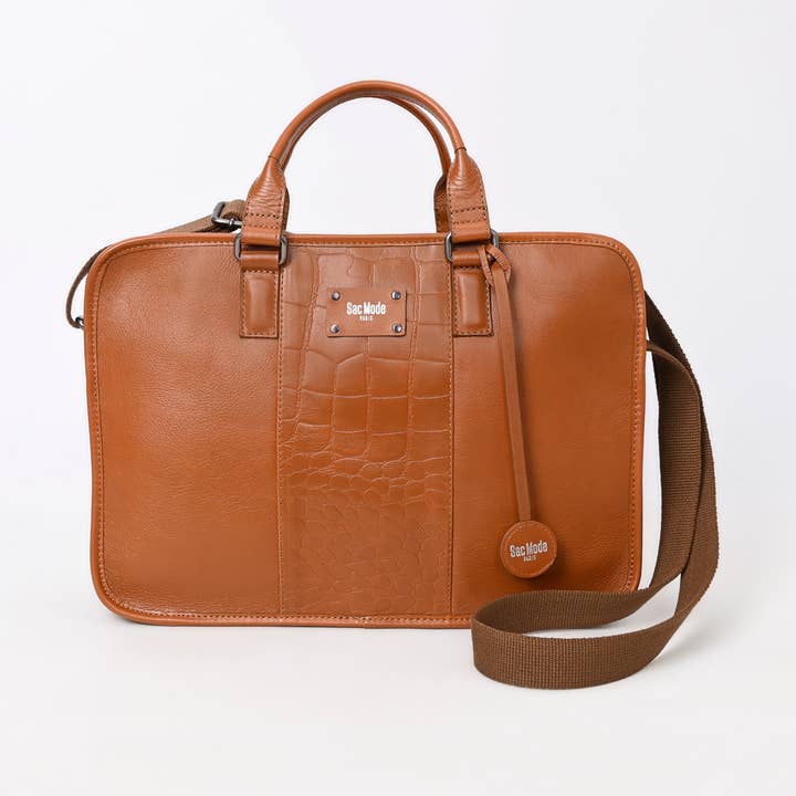 Sacoche d'ordinateur portable haut de gamme en cuir avec détail embossé crocodile pour la vente par Ganges Grain Inc