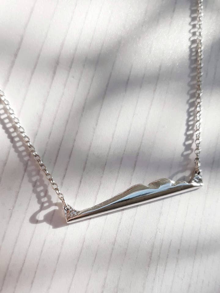 Holy Isle Pendant Necklace for wholesale by Jess MacDonald Brass