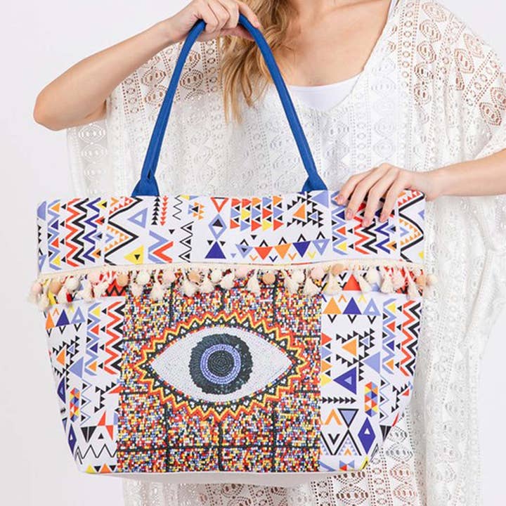 MT EVIL EYE BOHO PRINT POM POM FRINGE TOTE BAG for wholesale on Faire3