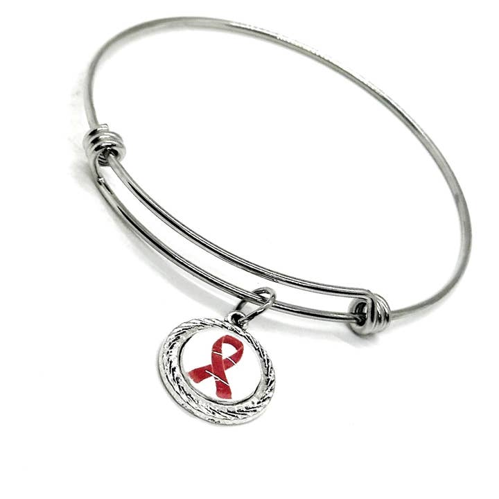 Pulsera con colgante de cabujón de cinta roja de concienciación, joyería de cinta roja, regalos de concienciación, colgante de concienciación sobre el SIDA, VIH y enfermedades del corazón. para venta al por mayor de JKCE Designs