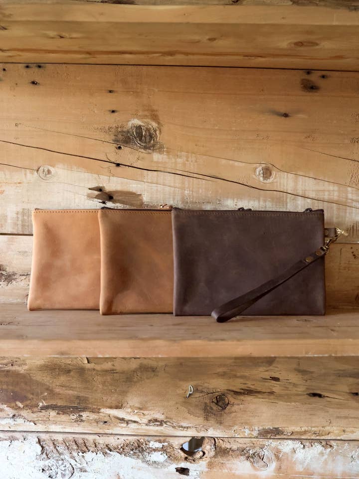 La pochette in pelle per la vendita all'ingrosso da parte di Jubilee Trading Co. | Ethical Trade Decor + Accessories