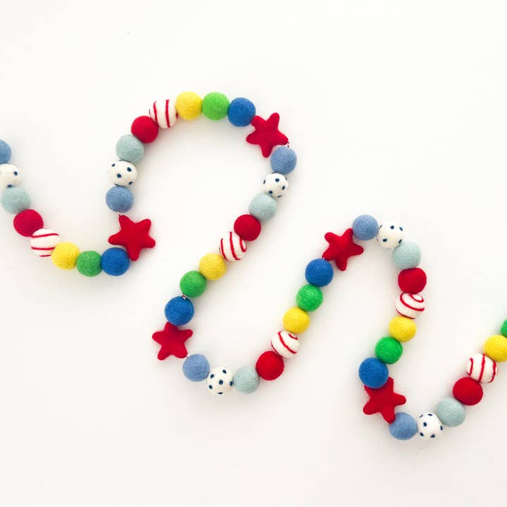 Superhero Felt Ball Garland w/ Green for wholesale by Pearl & Jane