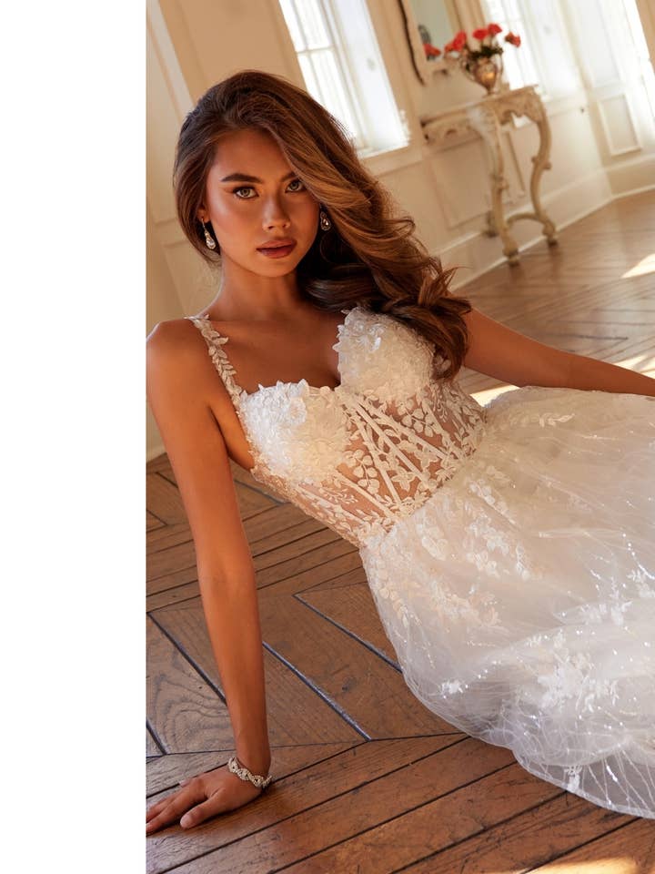 JT2495AW 3D floral ballgown with sheer corset bodice for wholesale by Juliet