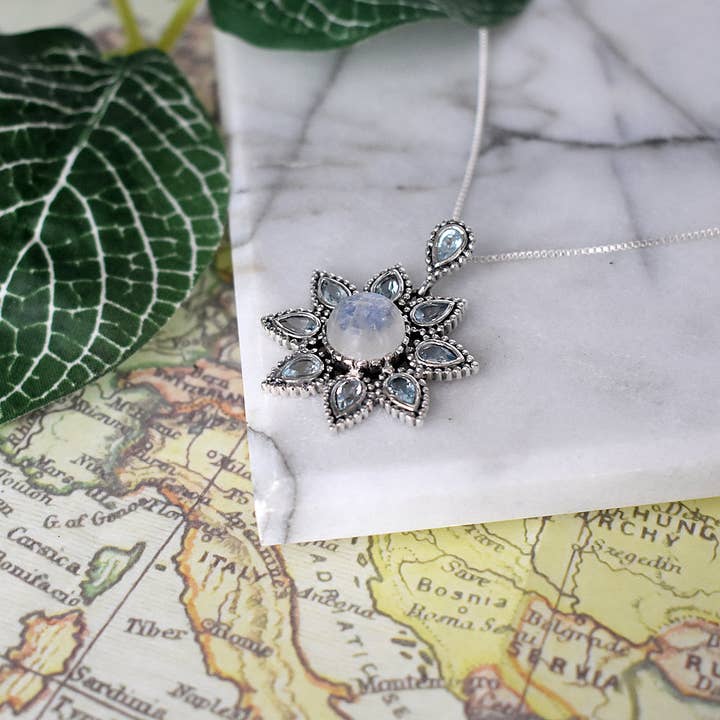 Isla rainbow moonstone and blue topaz vintage flower pendant for wholesale by Kali Ma Designs - Sterling Silver Jewellery