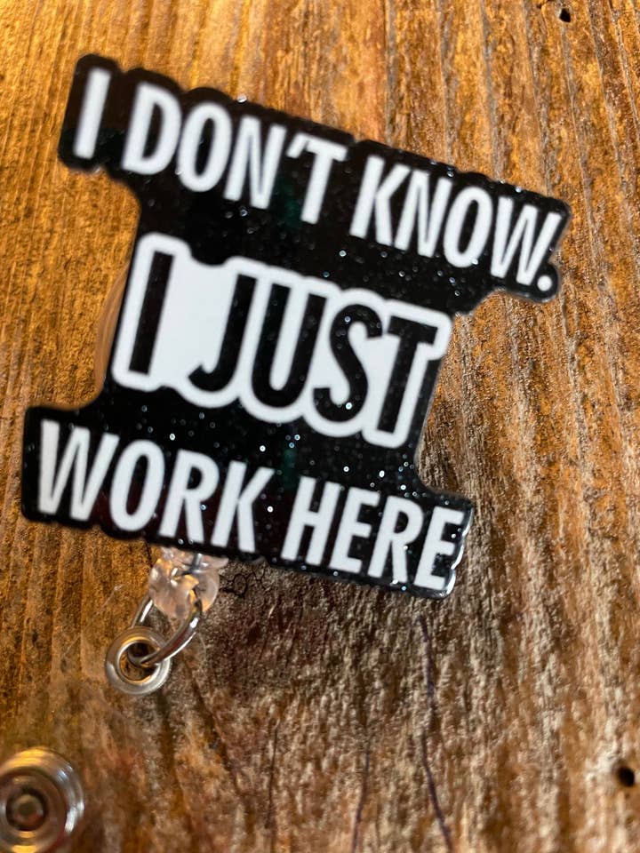 Badge Reel "IDK, I just work here" black for wholesale by The Wild Poppy