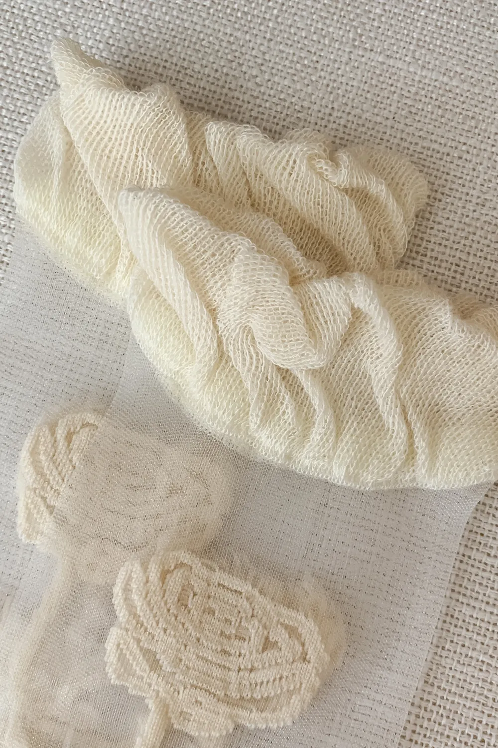 Sheer socks with embroidered rose 🌹✨ for wholesale on Faire1