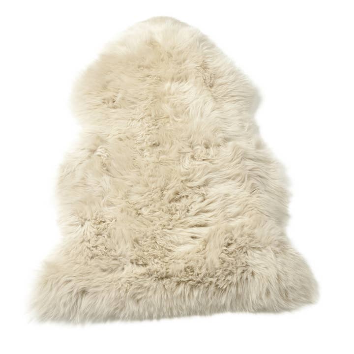 Ivory Soft Deep Pile Sheepskin Rug in Natural White for wholesale on Faire1