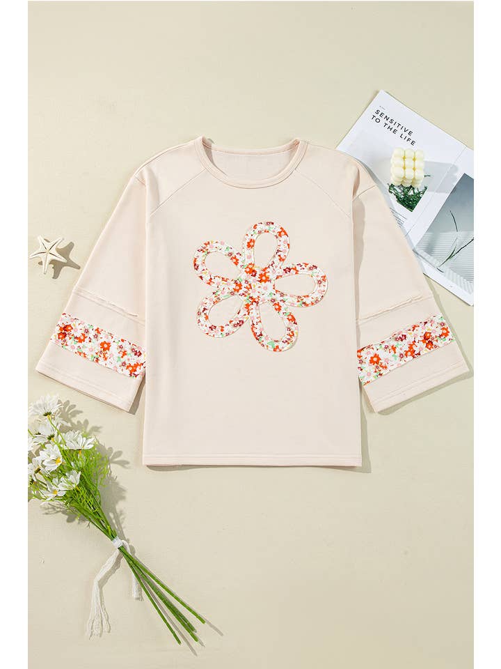 Beige Plus Size Flower Patched Side Slits Crewneck Top (S-4X) for wholesale on Faire4