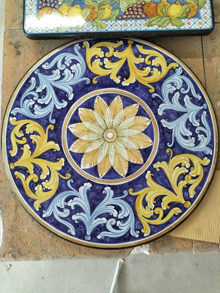 Round Table with Ornate Blue and Yellow Floral Decoration – Decorated Lava Stone for wholesale by DD Ceramiche Siciliane