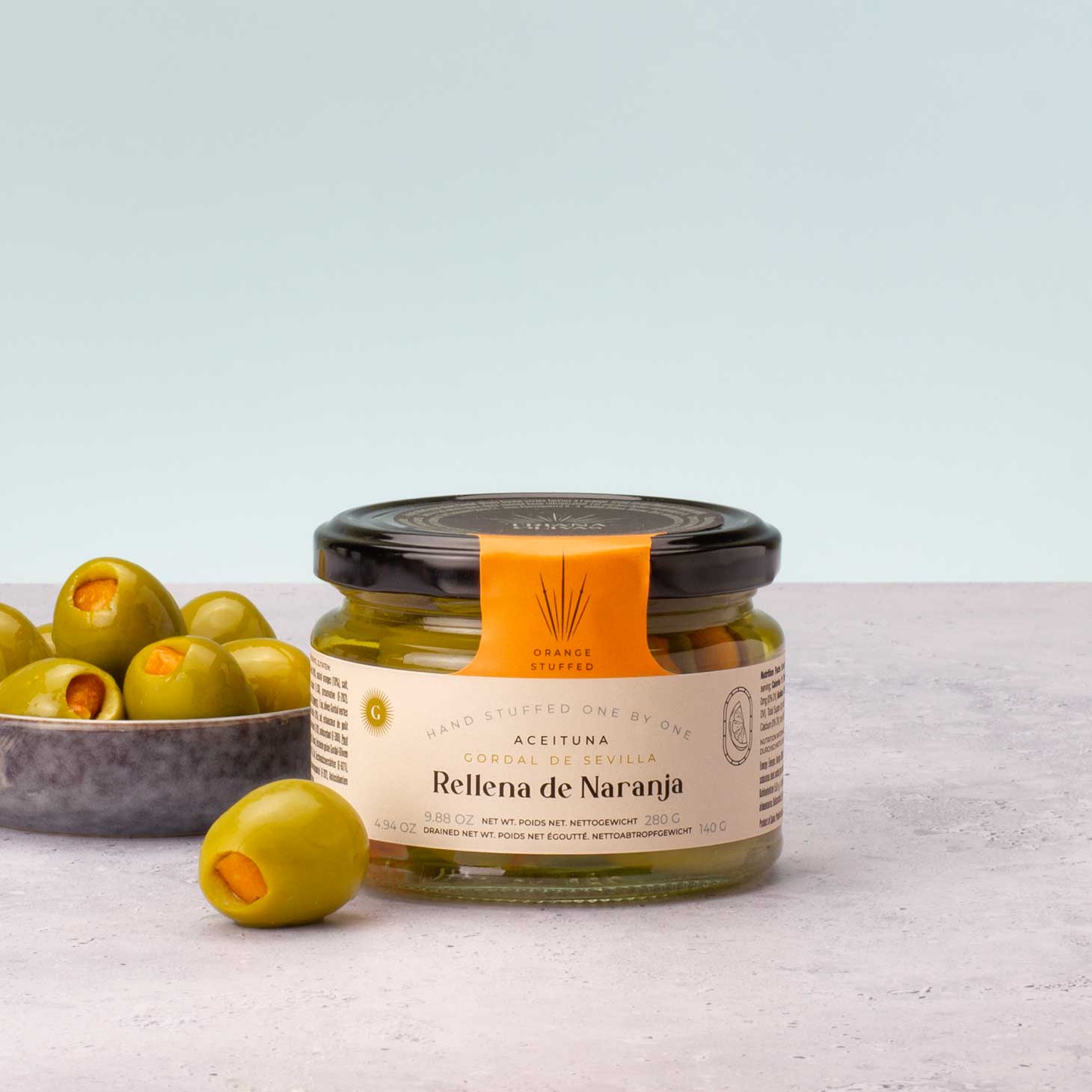 The French Farm - Wholesale Olives - Triana Olivas Orange stuffed Gordal Olives 9.88oz3