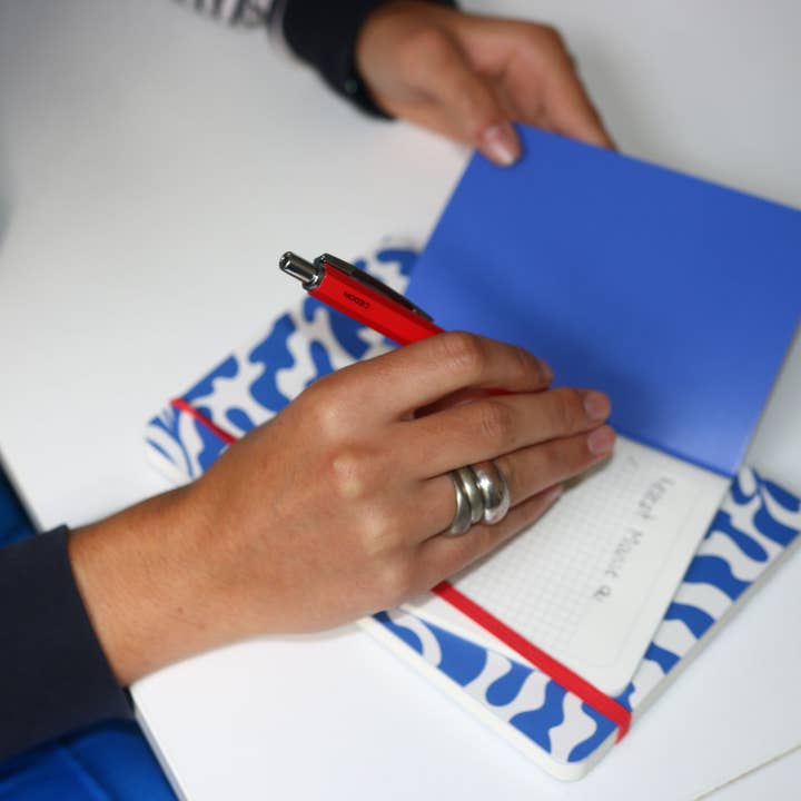 Stylo à bille brillant rouge pour la vente par CEDON