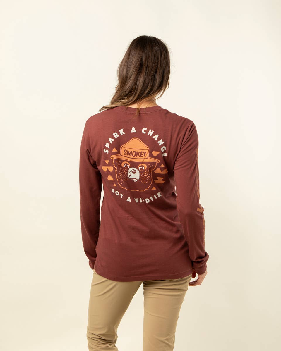 Angostura Spark A Change Unisex Long Sleeve Tee w/ Pocket for wholesale on Faire2