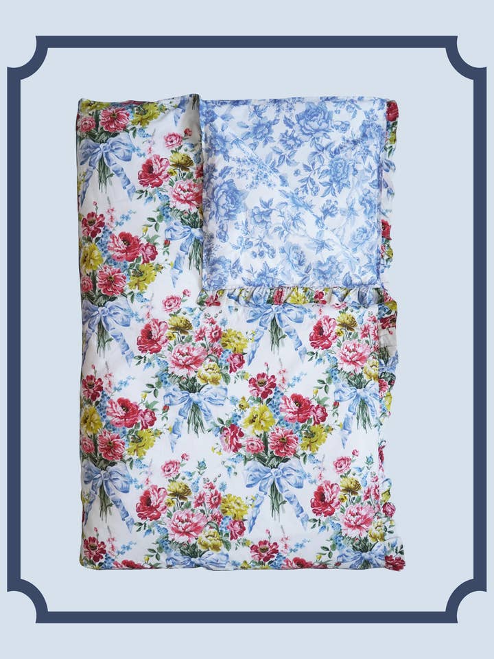 Bridgerton Reversible Ruffle-Edge Heirloom Quilt made with Liberty Fabric BOW BOUQUET BLUE & REGENCY TRAIL CHINA BLUE for wholesale by Coco & Wolf