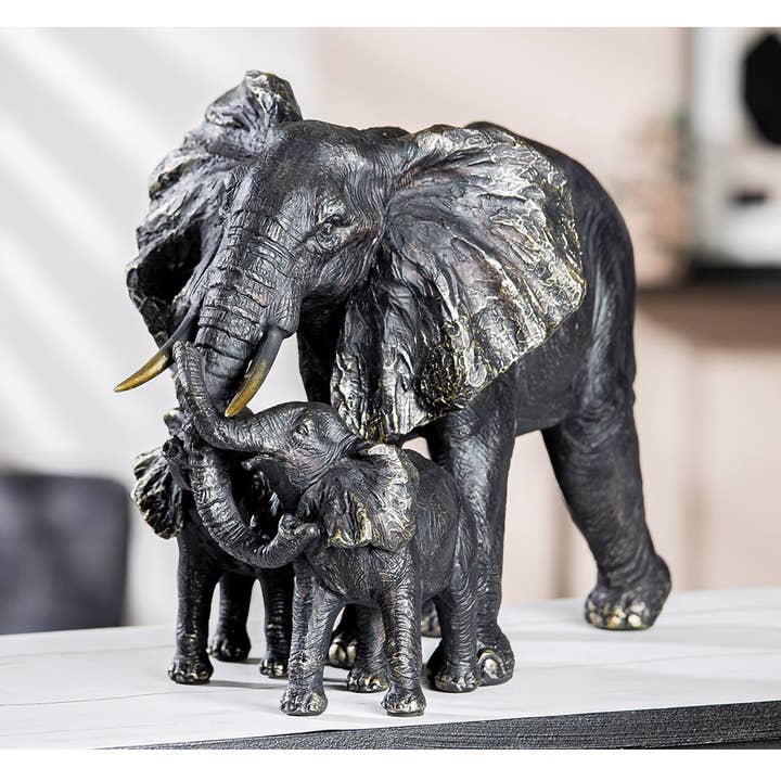 Elefantfigur i sort harpiks med guldfarvede detaljer, H. 26,5 cm for engroshandel hos Gilde Handwerk Macrander GmbH & Co. KG