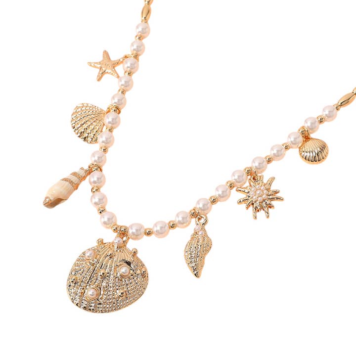 Sensibling Corp. - Wholesale Pendant/Charm Necklace - Sea Shell Puka Shell Starfish Charm Station Pearl Necklace