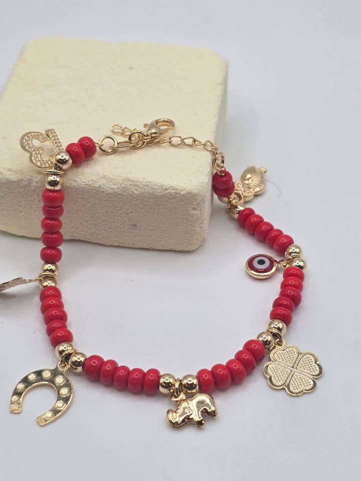 Lucky chamrs bracletes brasilian gold 14K pulsera dijes de la suerte en Oro Laminado 14K for wholesale by Fui fui jewelry llc