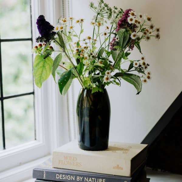 Curve Olive Glass Vase and other Purchase wholesale glass wine bottles. Free returns & net 60 terms on Faire trending on Faire.