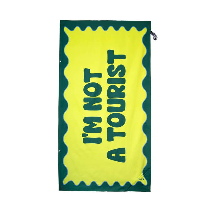Beach towel "I'm not a tourist" for wholesale by Fisura