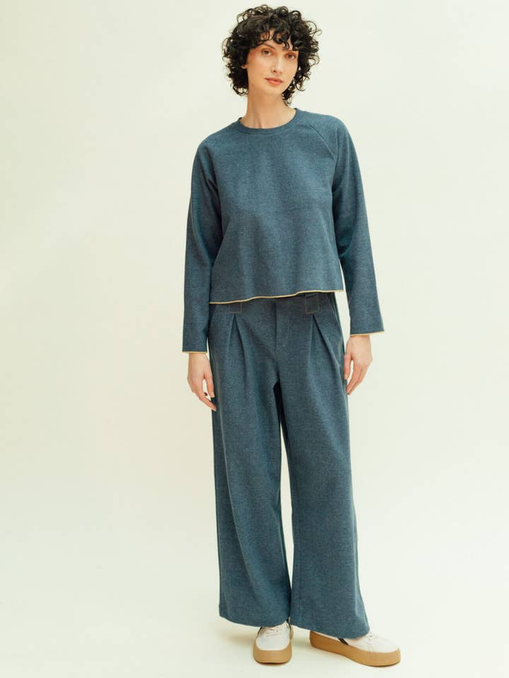 Pantalone blu a pieghe per la vendita all'ingrosso da parte di PAN Producto Básico