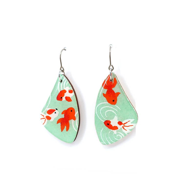 Mint green goldfish titanium dangle earrings for wholesale by autumn + tree
