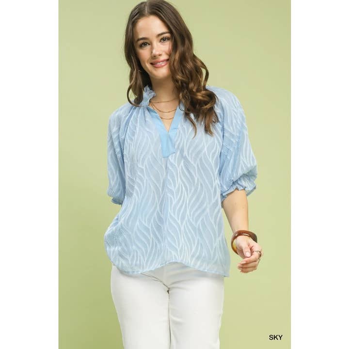 Blusa a maniche a sbuffo con texture da donna per la vendita all'ingrosso da parte di Upmost