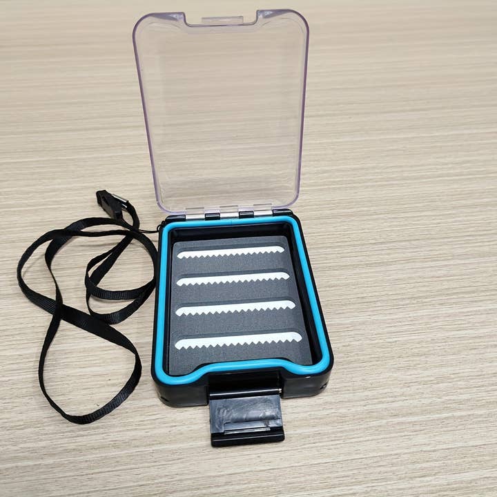 CANADA JME HEALTH NUTRITION CORP. - Wholesale Sporting Accessories - 1pc Transparent Fly Fishing Lure Storage Box with Adjustable Strap - Durable ABS Material, Single-Layer Design for Easy Access & Organization, Blue, Insect Imitation Storage | Compact Design | Waterproof Box, Fishing Tackle Box